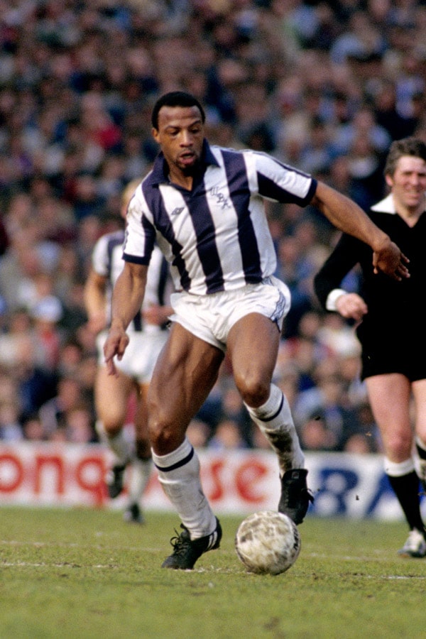 Cyrille Regis playing for west bromwich albion