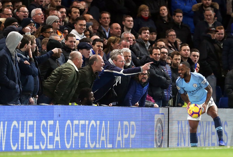 raheem sterling is a victim of racism in football seen here being abused by fans.